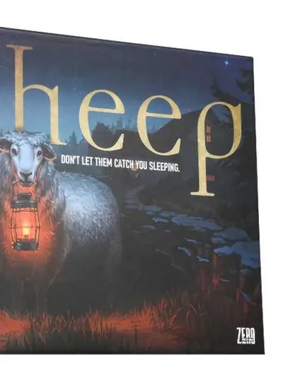 A board game box titled "The Sheep" features a menacing sheep holding a lantern, set against a dark, eerie forest backdrop. The title is prominently displayed in gold lettering, with the tagline "DON'T LET THEM CATCH YOU SLEEPING" beneath it. The overall color scheme is dark, with shades of blue and green, enhancing the horror-comedy theme of the game.