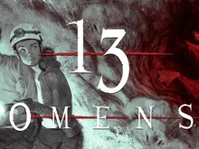 Two people in dim lighting, one wearing a helmet and holding a flashlight, the other following closely. A decrepit, textured wall in the background. Large, bold text reads "13" and "OME" with a red line crossing through the "M" and "E".