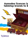 Open wooden Love Letter box with cards, tokens, and rulebook, surrounded by lightning bolts and waves.