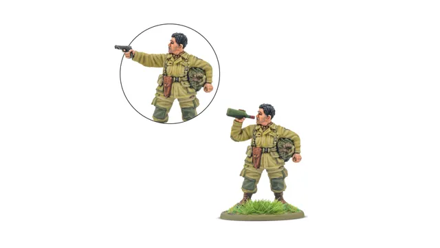A 28mm miniature of an American paratrooper named "Thirsty Work" is depicted, holding a bottle of wine in one hand while the other arm is posed to hold a pistol. The soldier is dressed in a light green uniform with a backpack and a belt, standing on a grassy base. An inset shows a close-up of the arm holding the pistol, emphasizing the dual options for the model.