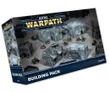 A packaging box for the Epic Warpath Building Pack, featuring a variety of modular, ruined buildings and fortified outposts designed for 10mm-scale wargaming. The box displays several grey structures, including a mix of intact and damaged buildings, alongside small bases that likely represent miniatures. The top of the box prominently features the title "EPIC WARPATH" in bold, blue letters, with "BUILDING PACK" clearly labeled at the bottom.