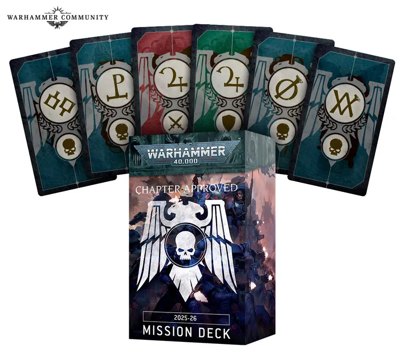 A collection of cards from the new Warhammer 40,000 mission deck is displayed, featuring various designs and symbols in different colors, including red, green, and blue. The central box, labeled "CHAPTER APPROVED 2025-26 MISSION DECK," showcases the iconic Warhammer 40,000 logo with a skull and wings, set against a backdrop of dark, armored figures. The cards are arranged behind the box, highlighting their unique artwork and mission icons.