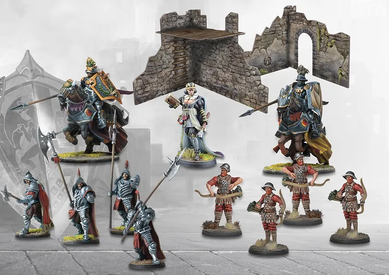 Miniature warriors and a stone ruin with a wooden platform.
