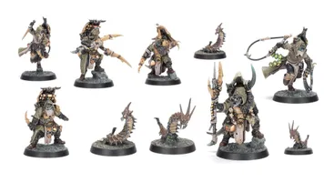 A collection of six intricately designed miniatures representing the Sha’dar Hunters from Necromunda, accompanied by their Arthromite spinewyrms. The hunters are clad in rugged, post-apocalyptic armor, featuring various weapons and gear, while the spinewyrms exhibit a segmented, menacing appearance. The bases of the miniatures are textured to resemble the harsh terrain of the Ash Wastes, enhancing the overall theme of survival in a desolate environment.