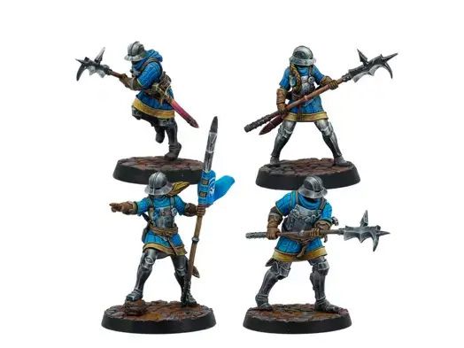 Four miniatures are displayed, each depicting armored soldiers in blue and gold attire. They wield various weapons, including a spear and a spiked mace, and are posed dynamically on textured bases. The figures showcase intricate details, such as helmets and clothing, emphasizing their role as experienced soldiers in a fantasy setting.