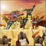 A group of colorful Space Frogmen miniatures stands atop a sandy, fortress-like structure, each wielding futuristic weapons. The frogmen are adorned in vibrant armor, featuring hues of blue, green, purple, and red, with intricate details like feathers and mechanical elements. In the foreground, two additional frogmen are partially visible, facing away from the viewer, suggesting a larger scene of camaraderie or preparation for battle against a dramatic sunset backdrop.