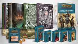 A collection of items from the forthcoming Warhammer: the Old World roleplaying game is displayed prominently. In the background, two large hardback books, the Player's Guide and Gamemaster's Guide, feature intricate cover art, while a character sheet pad is visible to the right. In the foreground, various reference card packs and a set of dice are arranged neatly, showcasing their colorful designs and thematic artwork.
