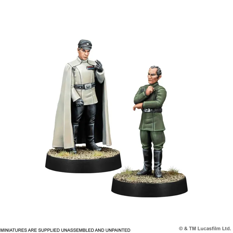 Two unpainted miniatures from the Star Wars: Legion game are displayed on black bases. On the left, a tall Imperial officer in a gray uniform and black boots stands with a commanding posture, wearing a cape and holding a device in his right hand. To the right, a shorter officer in a green uniform stands with his arms crossed, displaying a thoughtful expression. Both figures are set against a simple, textured base that suggests a rocky terrain.
