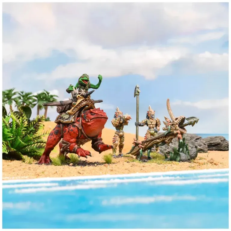 A vibrant scene depicts a large, red amphibious creature, ridden by a small green figure, set against a sandy beach with palm trees and a blue ocean in the background. To the right, two fish-like warriors wielding spears stand beside a skeletal structure resembling a fish, adding to the fantastical atmosphere. The overall setting combines elements of a tropical environment with whimsical characters, highlighting the playful nature of the miniatures.