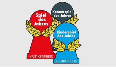 Three pawn-shaped awards with laurel wreaths. The red award reads "Spiel des Jahres" and "KRITIKERPREIS". The dark gray award reads "Kennerspiel des Jahres". The blue award reads "Kinderspiel des Jahres" and "KRITIKERPREIS".