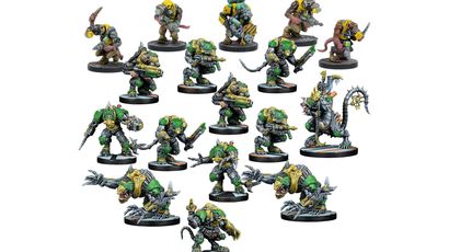 A diverse group of Verr-Myn miniatures is displayed, showcasing various characters from the faction. Prominent figures include heavily armored Stalkers and Runners wielding weapons, alongside smaller Thralls and a formidable Crone Mother with bio-augmented features. The miniatures feature a mix of green and gray colors, with intricate details highlighting their cybernetic enhancements and weaponry, all set against a plain white background.