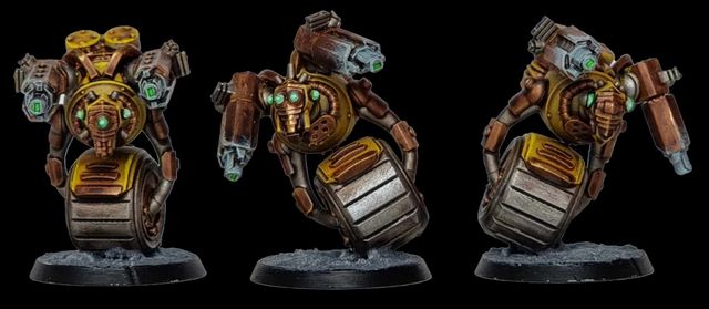A detailed miniature of a robotic character features a round body with a metallic, silver barrel-like base and a prominent, circular golden core. It has two mechanical arms, one equipped with a green-tipped weapon and the other with a series of intricate gears and glowing green eyes. The figure stands on a textured black base, showcasing a weathered, industrial aesthetic with hints of rust and wear.