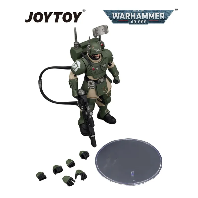 Green armored Warhammer 40,000 action figure with gun, hose, and accessories. JOYTOY and Warhammer 40,000 logos.