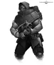 A muscular figure known as Vandoth the Fallen stands menacingly, clad in a dark, hooded cloak and armored vest. He holds a futuristic firearm, showcasing his imposing presence and readiness for battle. The character's face is partially obscured, adding to his intimidating aura, while various pouches and weapons are visible on his belt, emphasizing his role as a formidable opponent in the Necromunda universe.