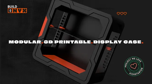 A sleek, 3D-printable display case designed for collectors, featuring a black exterior with angular lines and a vibrant red base. The case is shown from a slightly elevated angle, highlighting its modular design and snap-fit assembly, which requires no tools. The text "3D-PRINTABLE. DISPLAY CASE." is prominently displayed, along with a "PROJECT WE LOVE" badge from Kickstarter.