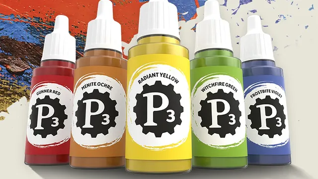 Four bottles of P3 Paints are prominently displayed against a colorful, textured background. The bottles include Menite Ochre, Radiant Yellow, Witchfire Green, and Frostbite Violet, each featuring a distinctive label with the P3 logo. The vibrant colors of the paints contrast with the dynamic splashes of paint in the background, highlighting the artistic theme of the image.