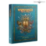 Closed hardcover book titled Warhammer: The Old World Rulebook. Teal cover with gold embossed emblem featuring crossed swords, skull, and eagle. Text reads "Fantasy Battles in the World of Legend."