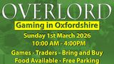 A promotional graphic for the Overlord Wargaming show features bold text on a vibrant green background. The title "OVERLORD" is prominently displayed at the top, followed by details about the event, including the date—Sunday, 1st March 2020—and the time—10:00 AM to 4:00 PM. Additional information highlights activities such as games, traders, a bring-and-buy sale, and mentions that food will be available along with free parking.