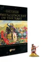 A book titled "Rome's Conquest of the East" from the Hail Caesar series is prominently displayed, featuring a colorful illustration of ancient warriors in battle, including a mounted figure in a purple cloak. The book cover includes the subtitle "Fighting the Battles of the Mithridatic Wars of 88-63 BC with Model Soldiers." Next to the book, there is a miniature figure of Julius Caesar, depicted in early Roman armor, holding a sword and standing on a small base with grass.