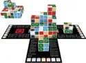 Wooden cube strategy game components: 27 colored cubes arranged in partial 3x3 grids, each with distinct patterned faces—forest green, ocean blue, cave gray, desert tan, lava red, and tundra white.