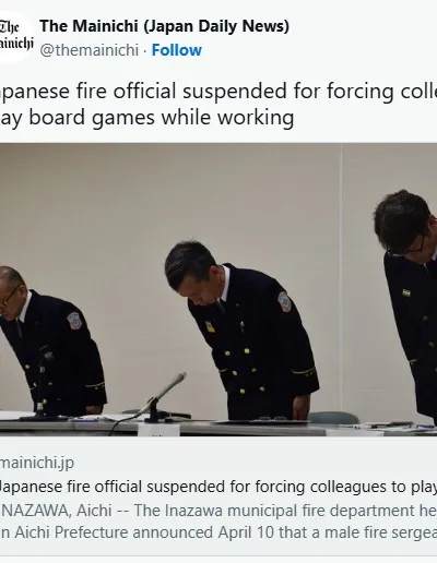 Three firefighters in uniform are bowing their heads in a formal setting, likely during a press conference or disciplinary meeting. The two on the left are wearing dark blue uniforms with badges, while the one on the right has a slightly different posture, suggesting a moment of reflection or apology. The background is neutral, focusing attention on the individuals and their solemn demeanor.