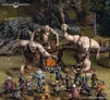 Three large trolls, each with distinct features and wielding makeshift weapons, are positioned around a campfire in a forested setting. In the foreground, a group of characters from Thorin's Company, including dwarves and a wizard, are depicted in various poses, preparing for confrontation. The scene captures the tension of the moment, with detailed terrain elements like rocks and trees enhancing the atmosphere.
