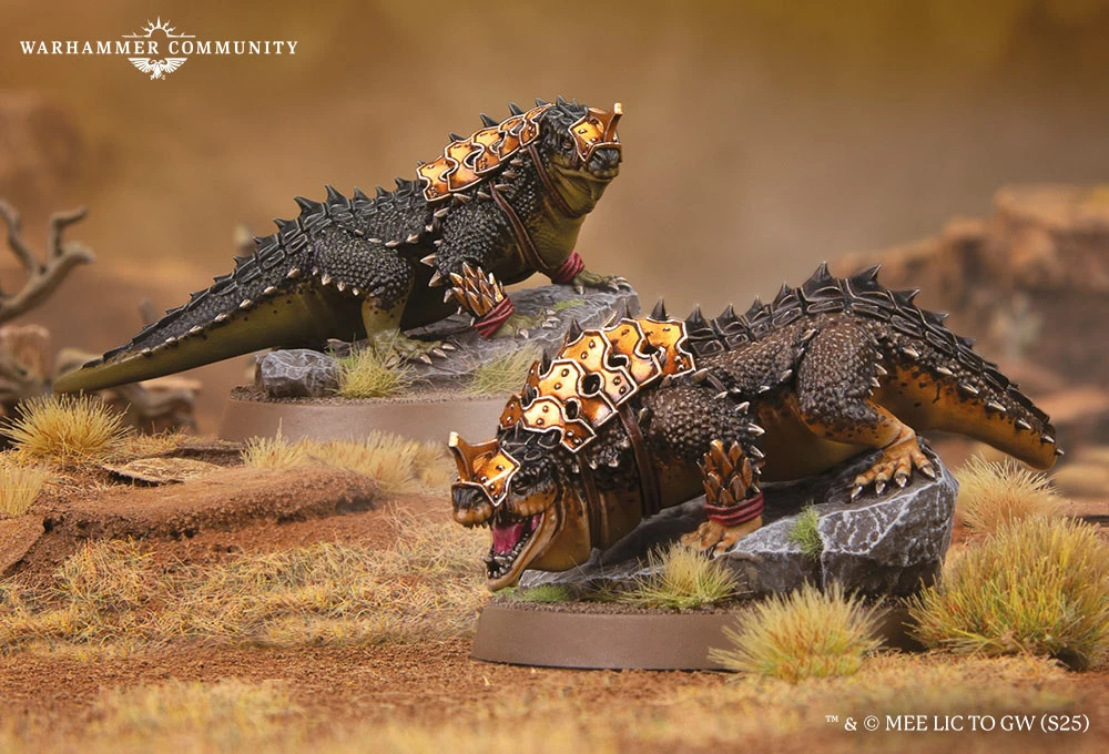 Two fierce war drakes of Rhûn are depicted, showcasing their armored backs adorned with golden spikes and intricate details. The drakes are positioned on rocky terrain with tufts of grass, one drake displaying a menacing expression while the other appears poised and alert. Their scales are a mix of dark green and brown, emphasizing their formidable presence in the Middle-earth setting.