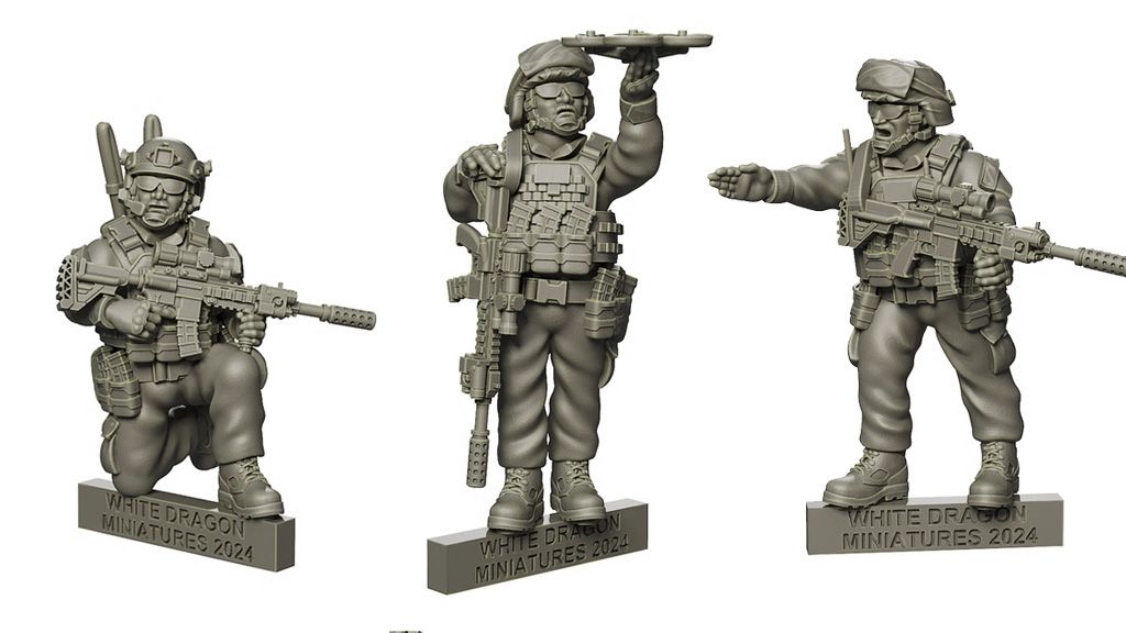Three detailed miniature figures of U.S. Marines are displayed, each standing on a base labeled 