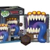 A Funko POP collectible features a Dungeons and Dragons Mimic designed as a treasure chest with a wide, gaping mouth filled with sharp teeth and a long, purple tongue. The Mimic is brightly colored, with orange accents on top, and is accompanied by a D20 die in front, showcasing intricate designs. The packaging displays the Funko logo and the number "423," indicating its series.
