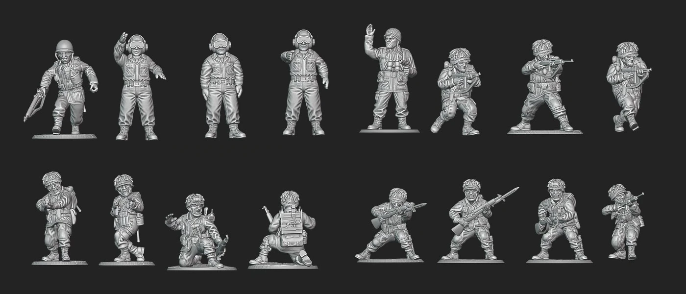 A collection of ten 28mm scale miniatures representing American soldiers from World War II is displayed against a black background. The figures include various poses, such as a soldier with a rifle, a paratrooper, and characters in military gear, showcasing details like helmets and uniforms. The miniatures are unpainted and feature intricate designs, highlighting the diversity of the U.S. armed forces during the 1944 campaign to liberate France.