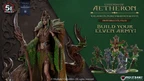 A detailed miniature of Galadren, the Marchwarden Queen, stands prominently, adorned in intricate green and brown attire that resembles foliage, emphasizing her connection to nature. She holds a curved staff, and her long hair is intertwined with leaves, enhancing her elven features. In the background, additional elven figures are partially visible, hinting at the accompanying entourage from the Legends of Aetheron series.