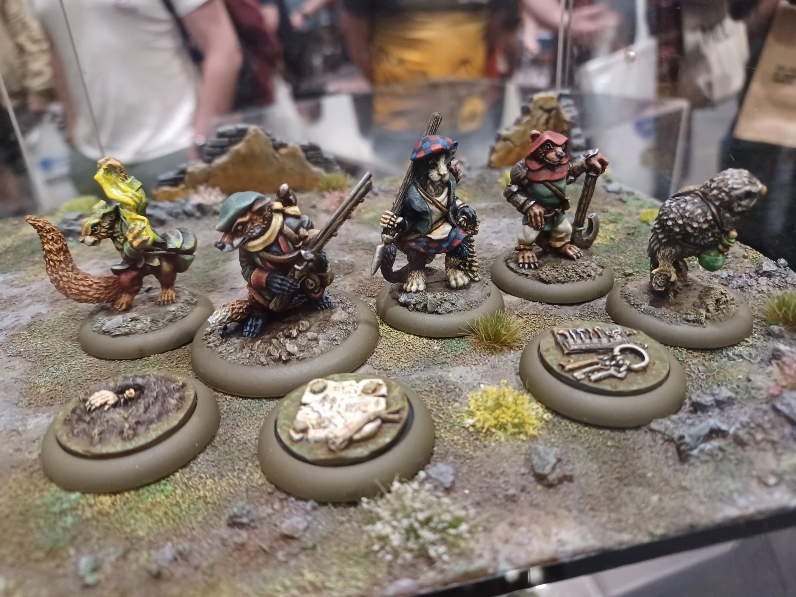 A display of intricately painted anthropomorphic miniatures from the
