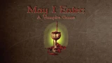 The title "May I Enter: A Vampire Game" is prominently displayed in an ornate font at the top of the image, set against a textured brown background. Below the title, a stylized goblet filled with a dark liquid is depicted, surrounded by red rose petals, with a soft green glow emanating from behind it. The overall design evokes a gothic and mysterious atmosphere, fitting for a tabletop RPG centered on vampire themes.