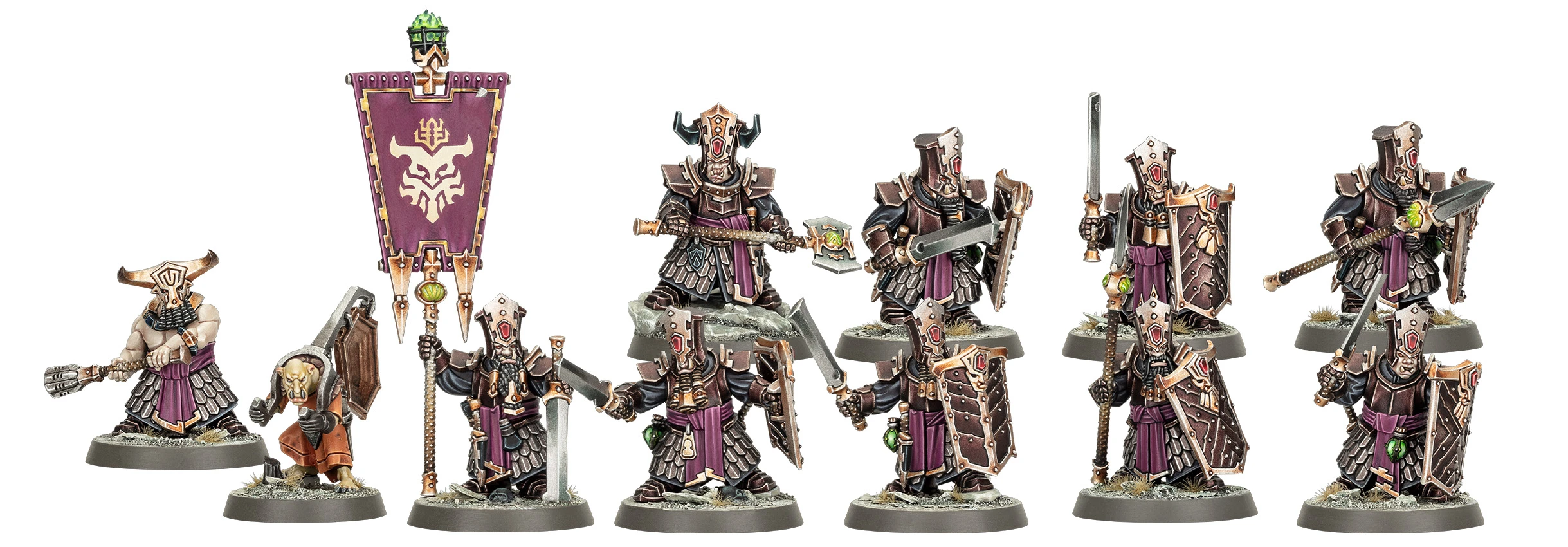 A group of five Zharrdron warriors stands in a dynamic formation, each clad in dark, ornate armor with intricate detailing. They wield a mix of weapons, including swords and shields, with some featuring glowing green accents. The warriors are set against a simple base with tufts of grass, emphasizing their imposing presence and the dark, industrial aesthetic of their design.