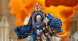 A detailed miniature of Marneus Calgar, a prominent character from the Warhammer 40,000 universe, is depicted in a striking pose. He wears ornate blue power armor adorned with gold embellishments, featuring a prominent Ultramarines symbol on his chest and a skull motif. The background is a dramatic orange, suggesting a fiery battlefield, enhancing the intensity of the scene.
