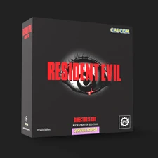 A black box featuring the title "RESIDENT EVIL" in bold red letters, with a stylized eye graphic in the center. Below the title, the text "DIRECTOR'S CUT KICKSTARTER EDITION" is displayed in orange, while "SURVIVAL HORROR" is highlighted in pink. The Capcom logo is positioned at the top right corner, and the Steamforged Games logo is located at the bottom left.