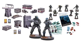 A collection of miniatures and game components from the Halo: Flashpoint series is displayed. In the foreground, two detailed resin miniatures represent UNSC Marine veteran Edward Buck and Captain Dare, both in combat-ready poses. Surrounding them are additional miniatures of Orbital Shock Troops, along with a booklet titled "HALO FLASHPOINT DESPERATE MEASURES," various character cards, and tokens for gameplay, all set against a white background.