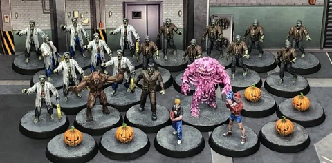 A collection of 30mm scale resin miniatures from the "Monsters Invaded My Town" set features various characters, including 16 zombies, a Frankenstein figure, a Sludge creature, a Werewolf, and two heroes. The scene includes five pumpkin spawn points, with the miniatures displayed on 32mm black plastic bases. The background shows a stylized urban environment, enhancing the thematic elements of the game.