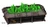 A detailed 3D rendering of a futuristic command board, featuring a dark metallic base with various control panels and pipes. The top surface is adorned with vibrant green crystalline structures resembling a cityscape, set against a grid pattern. The design includes an emblem on the side, indicating its thematic connection to a sci-fi universe.