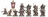 A group of five Zharrdron warriors stands in a dynamic formation, each clad in dark, ornate armor with intricate detailing. They wield a mix of weapons, including swords and shields, with some featuring glowing green accents. The warriors are set against a simple base with tufts of grass, emphasizing their imposing presence and the dark, industrial aesthetic of their design.