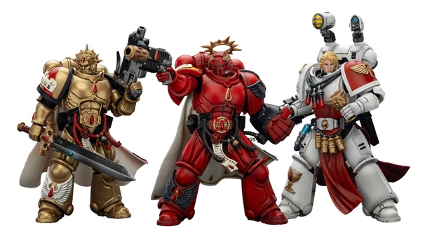 Three action figures representing Blood Angels Space Marines stand side by side. The first figure on the left is clad in red armor, holding a gun, and features intricate detailing. The central figure, also in red, has a prominent golden halo and a cape, while the figure on the right wears white armor with red accents and is equipped with various accessories, including a holstered weapon and a mechanical arm.