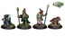 A trio of miniatures from Twilight Miniatures showcases characters from the world of Anyaral. In the center, a humanoid figure with a shield and spear wears a tunic and has a distinctive headdress, flanked by two smaller creatures: one resembling a small dinosaur with a collar, and another figure in a dark outfit on the left. The bases of the miniatures are adorned with tufts of grass, enhancing their fantasy aesthetic. The Twilight logo is displayed in the top corner.