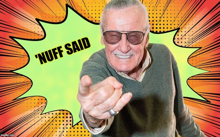 A man with gray hair and sunglasses, wearing a gray sweater, is pointing forward with a confident expression. The background features a vibrant comic-style explosion in yellow and orange, with the text