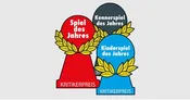 Three pawn-shaped awards with laurel wreaths. The red award reads "Spiel des Jahres" and "KRITIKERPREIS". The dark gray award reads "Kennerspiel des Jahres". The blue award reads "Kinderspiel des Jahres" and "KRITIKERPREIS".
