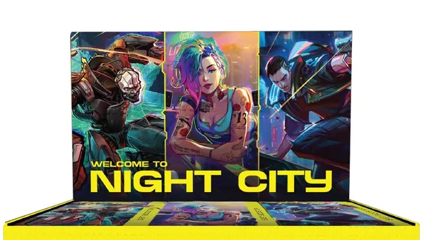 A brightly colored display box for the Cyberpunk Trading Card Game features a vibrant design with the text "WELCOME TO NIGHT CITY" prominently displayed at the top. The back of the box showcases three characters: a cybernetic figure, a woman with colorful hair and tattoos, and a man in a futuristic outfit, all set against a neon-lit backdrop. The bottom of the box is yellow with the title "Cyberpunk TCG" and the logo of CD Projekt Red, emphasizing the game's connection to the Cyberpunk universe.