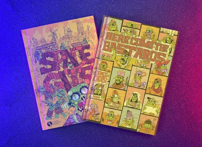 Two hardcover books are displayed against a gradient background of purple and blue. On the left, the book titled "Space Gits" features a colorful, chaotic illustration of space orcs amidst a whimsical landscape, with bold, stylized text. On the right, "Here Come The Bastards" showcases a vibrant cover filled with various orc characters in a comic strip style, prominently featuring the title in large, eye-catching letters. Both books reflect the playful and irreverent theme of the game.