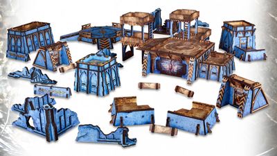 A collection of tabletop gaming terrain pieces in a futuristic style, featuring various structures such as buildings, platforms, and ruins. The pieces are predominantly blue with brown accents, showcasing intricate details and textures. Some structures are elevated, while others are flat, creating a diverse landscape suitable for gaming scenarios.