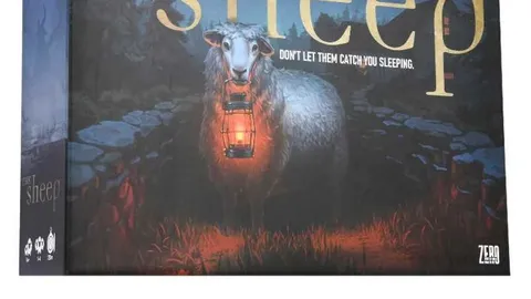 A board game box titled "The Sheep" features a menacing sheep holding a lantern, set against a dark, eerie forest backdrop. The title is prominently displayed in gold lettering, with the tagline "DON'T LET THEM CATCH YOU SLEEPING" beneath it. The overall color scheme is dark, with shades of blue and green, enhancing the horror-comedy theme of the game.