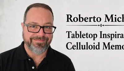 Man with glasses and beard, text "Roberto M Tabletop In Celluloid M"