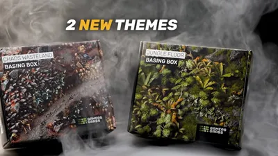 Two boxes labeled "JUNGLE FLOOR BASING BOX" and "CHAOS WASTELAND BASING BOX" with smoke.